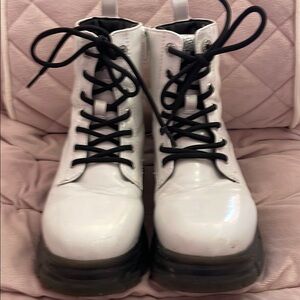 Skechers White and Black Combat Boots with Lace-Up Design